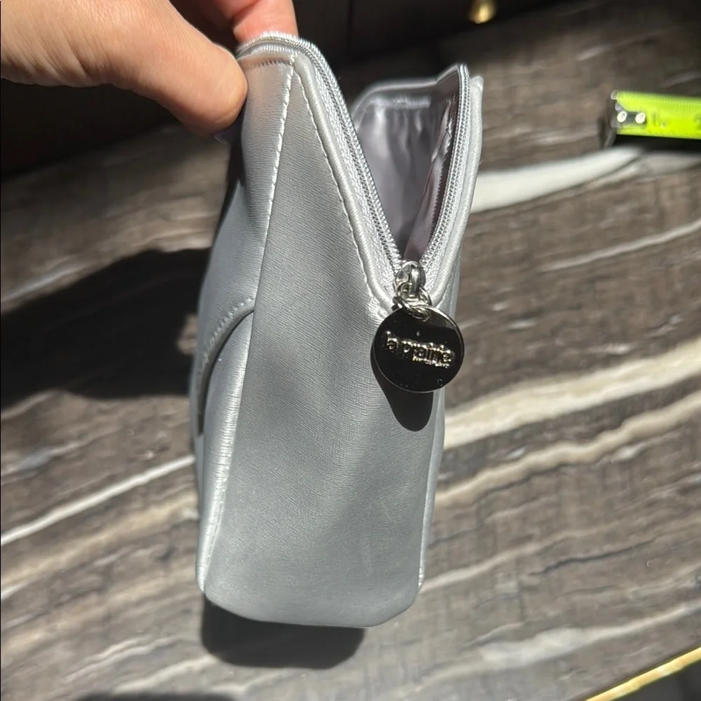 La Prairie Silver Cosmetic Bag with Geometric Design